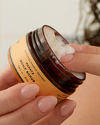 Exfoliating hair treatment shown as Ceremonia's Papaya Scalp Scrub, a creamy formula designed to deeply cleanse and revitalize the scalp.