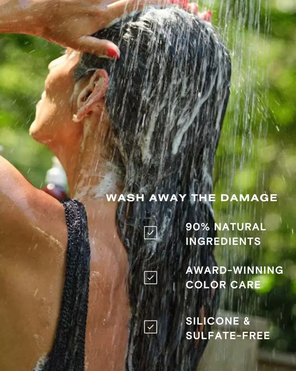 Guava shampoo being rinsed from hair outdoors, promoting natural ingredients and silicone-free formula.