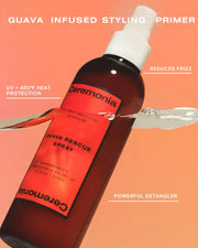 Hair detangler spray bottle mid-splash, highlighting UV and heat protection with guava-infused formula.