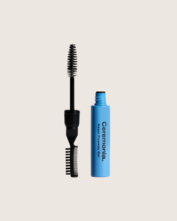 Ceremonia Pequi Flyaway Gel in a blue tube beside its 3-in-1 spooly and comb wand.