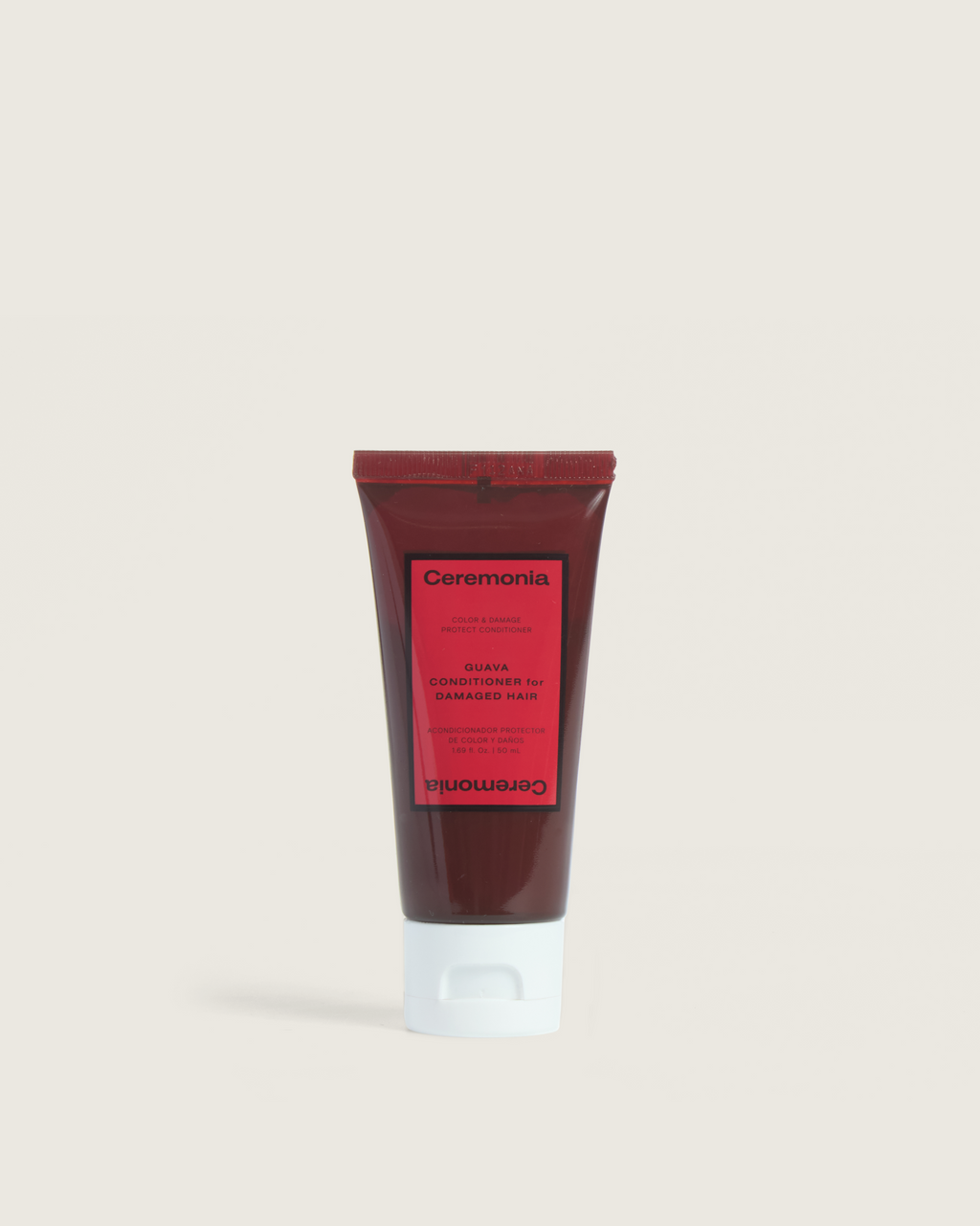 Conditioner for damaged hair from Ceremonia in a maroon tube labeled Guava Conditioner for color and damage protection.