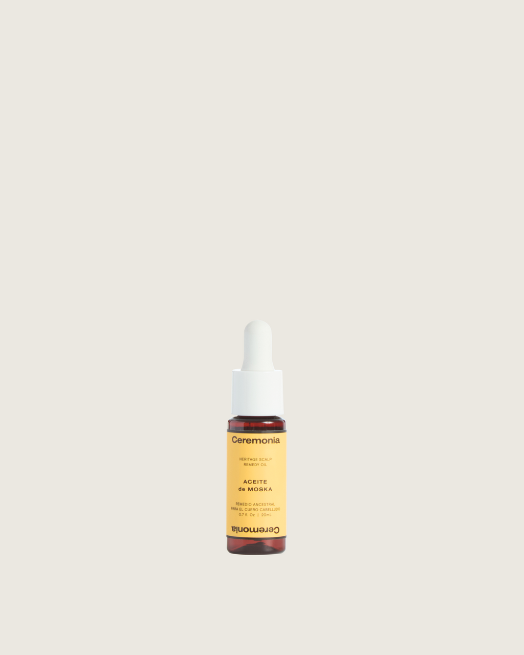Scalp oil labeled Aceite de Moska by Ceremonia in a small amber dropper bottle for targeted scalp care.