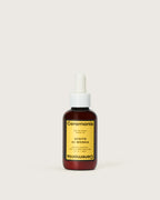 Ceremonia Aceite de Moska heritage scalp remedy oil in amber 60ml dropper bottle with yellow label.