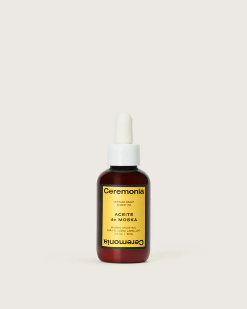 Ceremonia Aceite de Moska heritage scalp remedy oil in amber 60ml dropper bottle with yellow label.