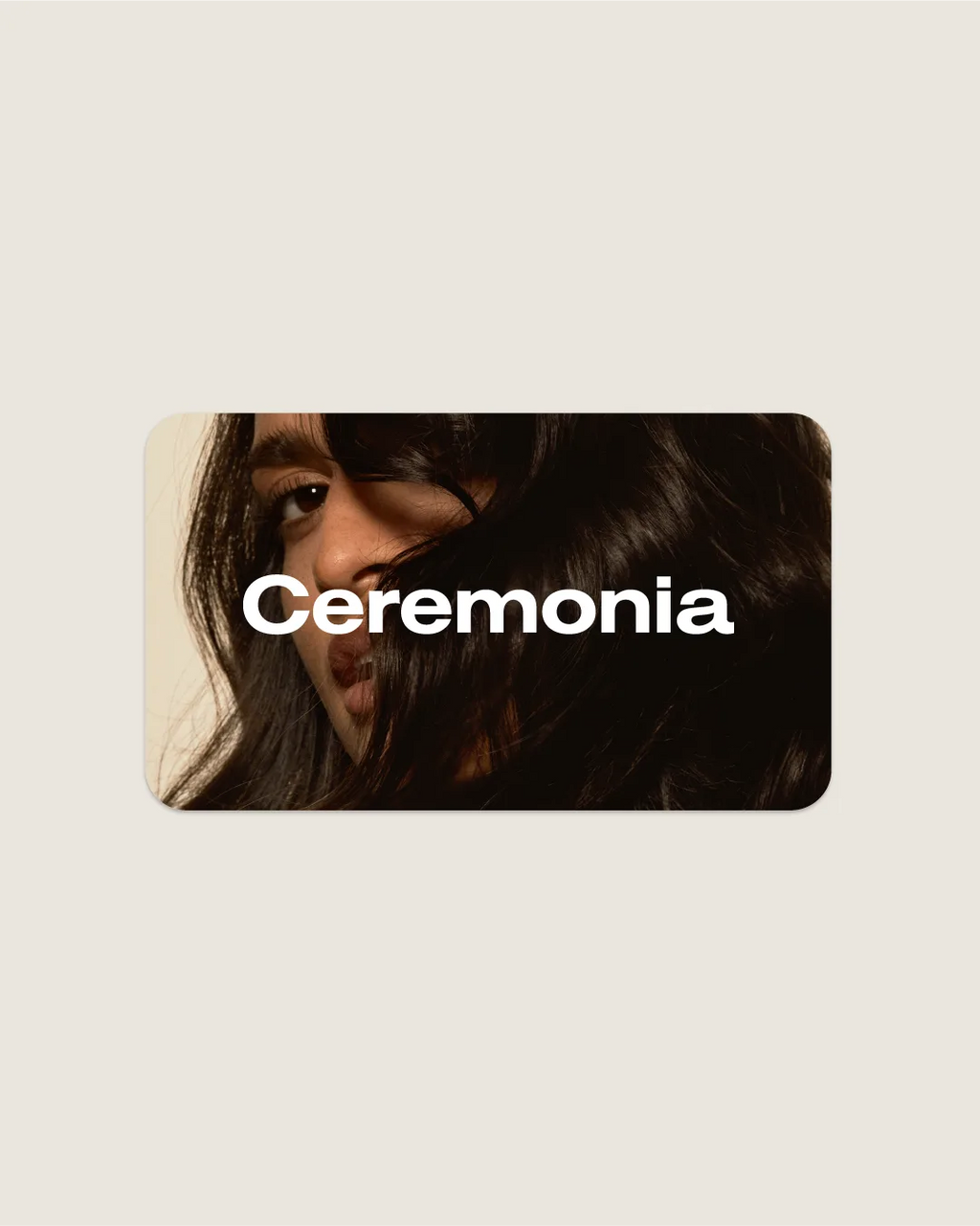 Ceremonia digital gift card featuring a close-up of flowing dark hair and brand wordmark.