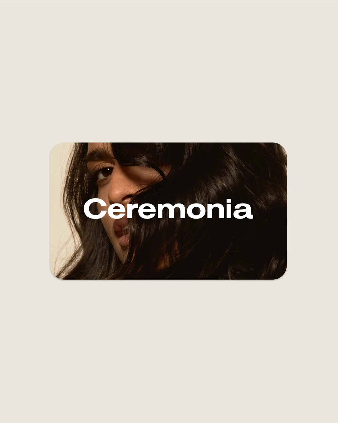Ceremonia digital gift card featuring a close-up of flowing dark hair and brand wordmark.