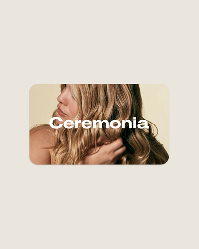 Ceremonia digital gift card featuring a person running fingers through long wavy blonde hair.