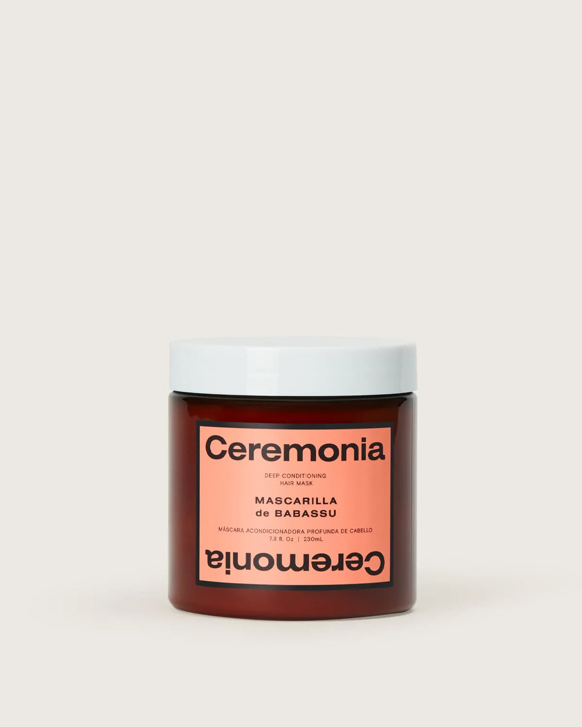 Ceremonia Mascarilla de Babassu deep conditioning hair mask in an amber jar with a white lid and coral label.