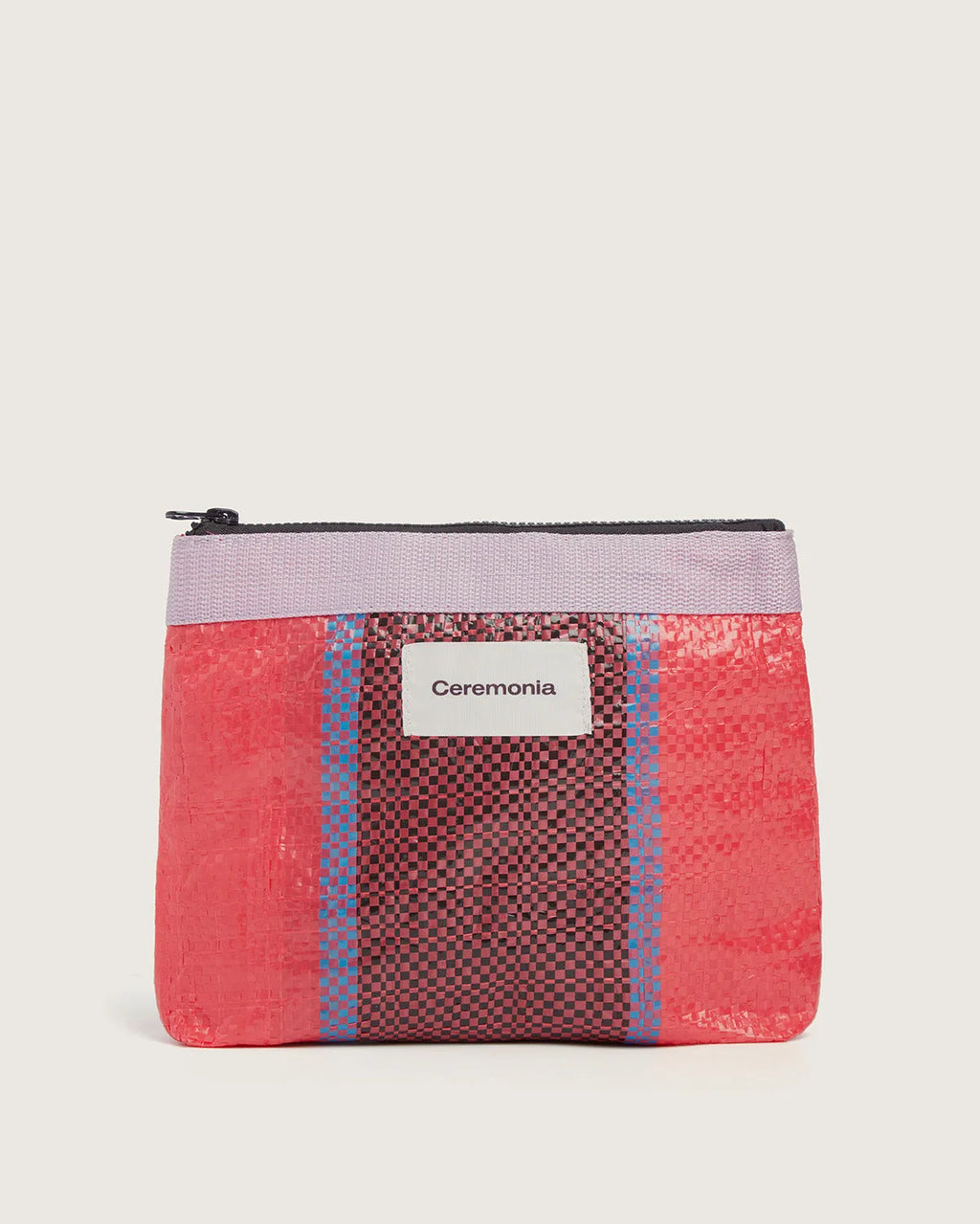 Coral pink upcycled Pouch de Mercado with woven black and blue stripes and lavender trim.